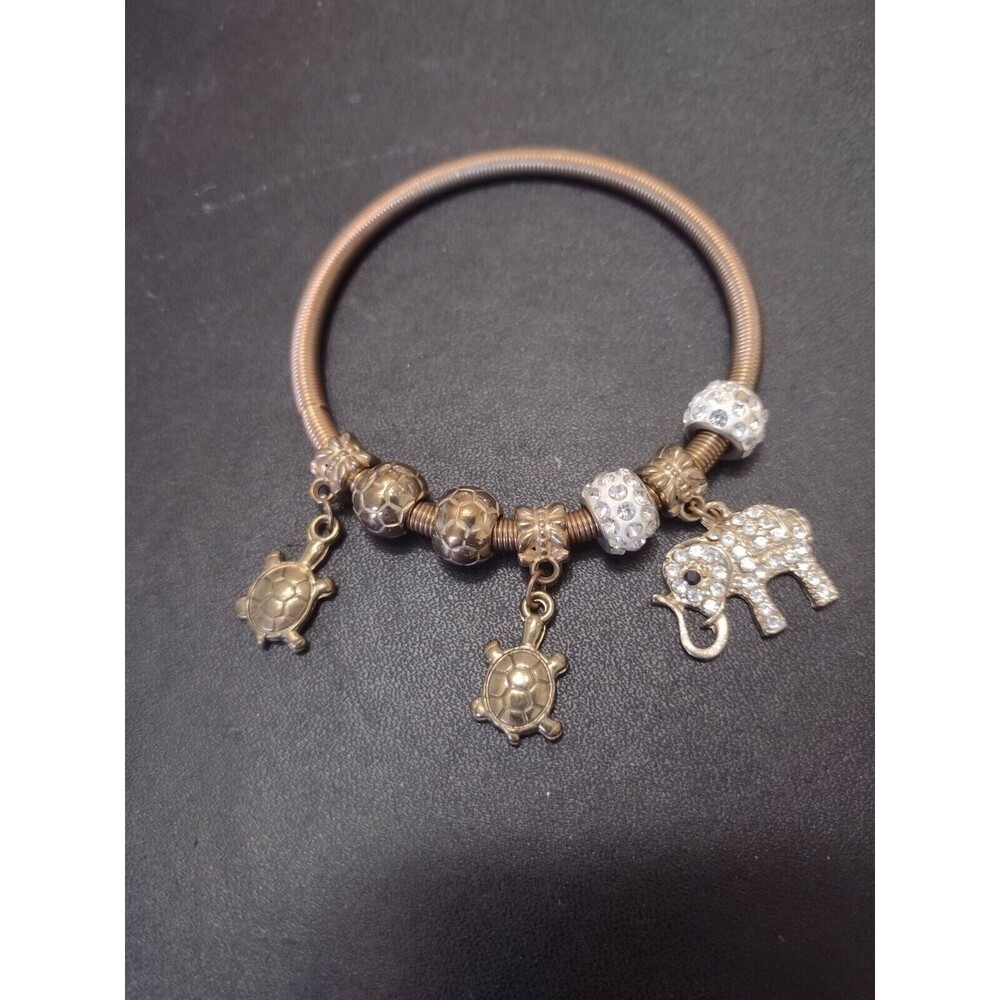 Stretchy elephant and turtle charm bracelet 7" gold tone